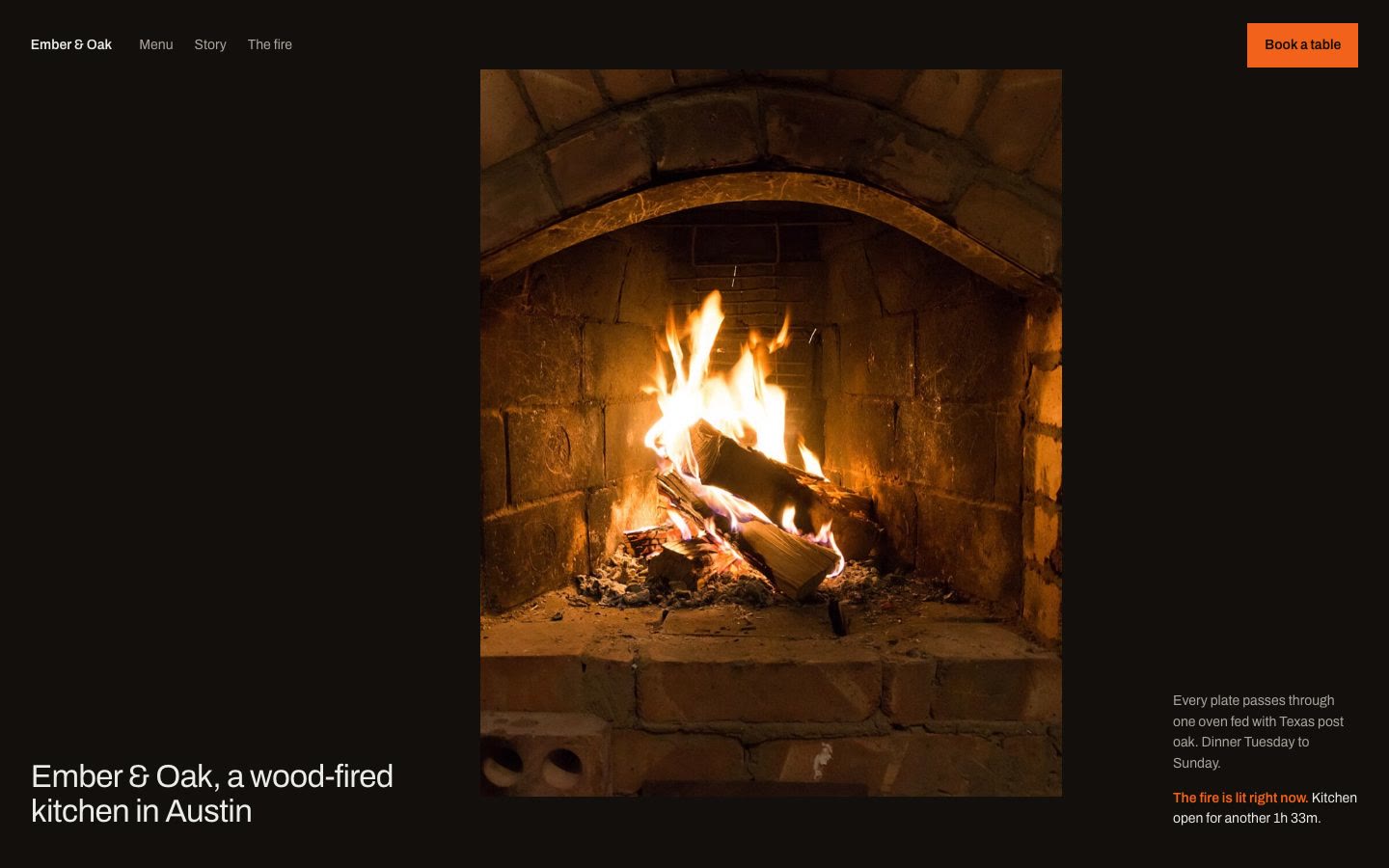 The Ember and Oak restaurant website on a computer